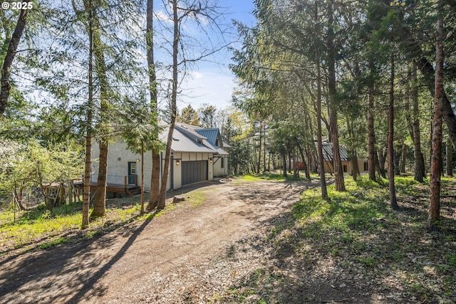 827 Tyler Creek Rd, Ashland, OR 97520 - view of yard featuring dirt driveway and an attached garage