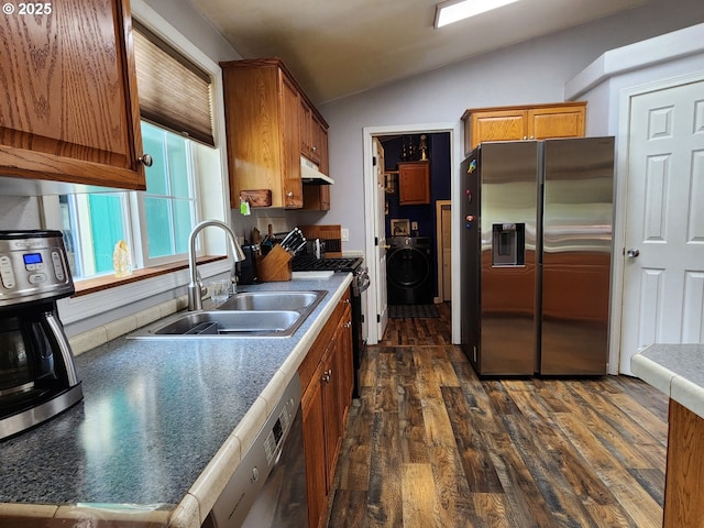 2420 Jefferson St, Port Orford, OR 97465 - kitchen featuring stainless steel fridge, washer / dryer, a sink, lofted ceiling, and under cabinet range hood