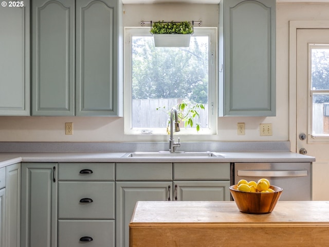 486 S Knott St, Canby, OR 97013 - kitchen featuring stainless steel dishwasher and light countertops