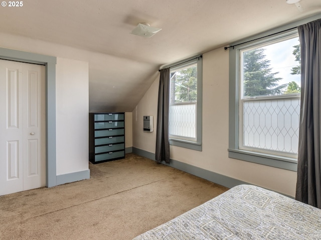 486 S Knott St, Canby, OR 97013 - carpeted bedroom with lofted ceiling and baseboards