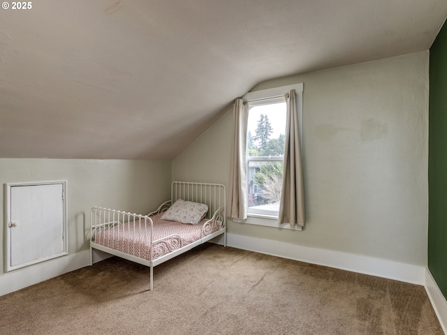 486 S Knott St, Canby, OR 97013 - carpeted bedroom with lofted ceiling and baseboards