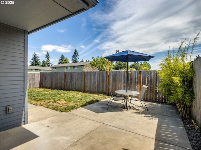 486 S Knott St, Canby, OR 97013 - fenced backyard featuring a patio area and outdoor dining space