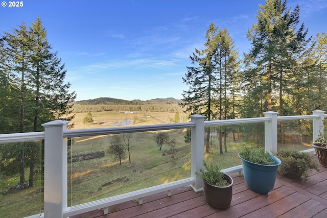 wooden terrace featuring a mountain view