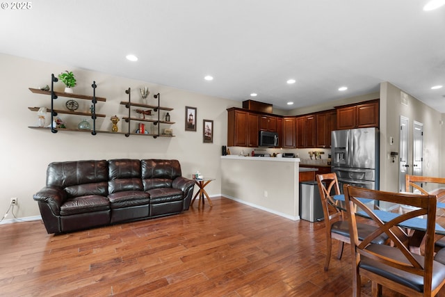 813 NW 1st Ave, Canby, OR 97013 - living area featuring light wood finished floors, baseboards, and recessed lighting
