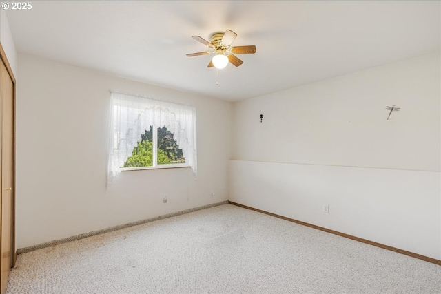 1825 Minnesota St, The Dalles, OR 97058 - spare room featuring baseboards, a ceiling fan, and light carpet