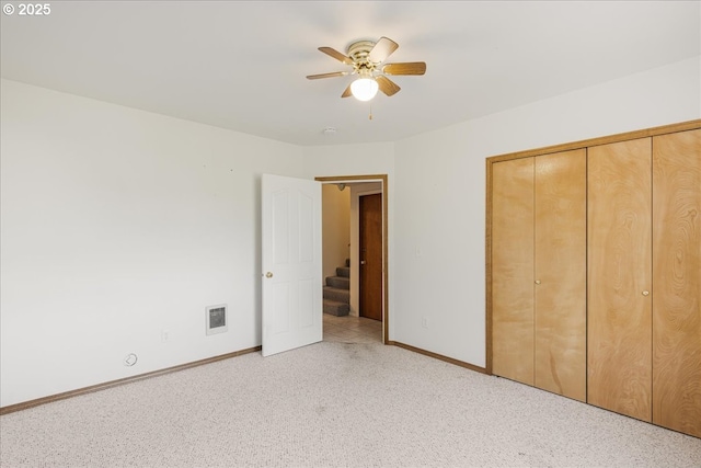 1825 Minnesota St, The Dalles, OR 97058 - unfurnished bedroom featuring a ceiling fan, baseboards, visible vents, and a closet