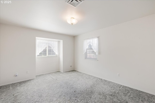 1825 Minnesota St, The Dalles, OR 97058 - unfurnished room with visible vents, carpet, baseboards, and a healthy amount of sunlight