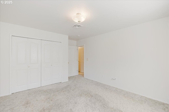 1825 Minnesota St, The Dalles, OR 97058 - unfurnished bedroom with carpet floors, visible vents, and a closet
