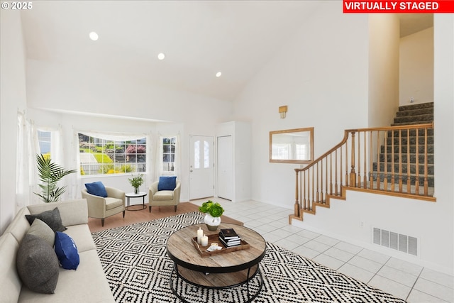1825 Minnesota St, The Dalles, OR 97058 - tiled living area featuring visible vents, stairway, high vaulted ceiling, baseboards, and recessed lighting