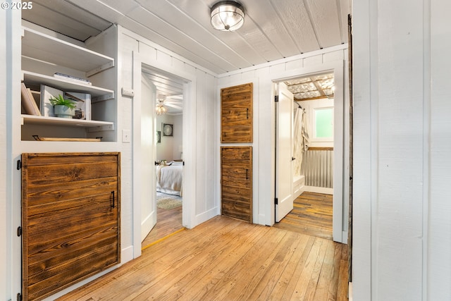 988 Savage Creek Rd, Grants Pass, OR 97527 - hall featuring light wood-type flooring