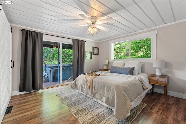 988 Savage Creek Rd, Grants Pass, OR 97527 - bedroom with access to outside, wood finished floors, baseboards, and ceiling fan