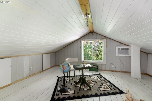 988 Savage Creek Rd, Grants Pass, OR 97527 - additional living space featuring a wall unit AC, hardwood / wood-style flooring, vaulted ceiling, wooden ceiling, and wood walls