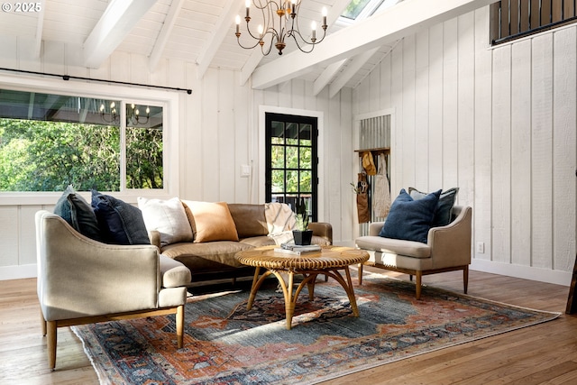 988 Savage Creek Rd, Grants Pass, OR 97527 - living room with a chandelier, wood finished floors, and wooden walls