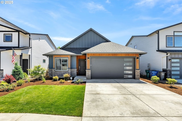 13009 NE 106th Cir, Vancouver, WA 98682 - view of front of home featuring board and batten siding, driveway, a front yard, a garage, and a shingled roof