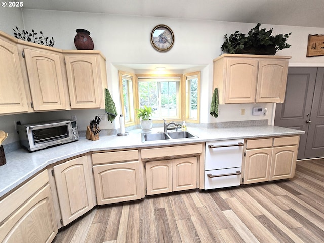 80393 Zimmer Ln, Hermiston, OR 97838 - kitchen featuring a sink, light brown cabinetry, light countertops, and light wood-style flooring