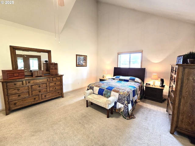 80393 Zimmer Ln, Hermiston, OR 97838 - bedroom featuring high vaulted ceiling, light carpet, multiple windows, and baseboards