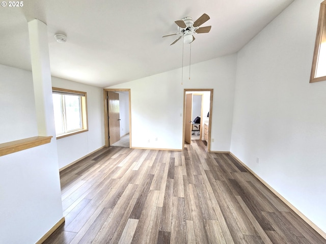 80393 Zimmer Ln, Hermiston, OR 97838 - unfurnished room featuring lofted ceiling, wood finished floors, a ceiling fan, baseboards, and a smoke detector