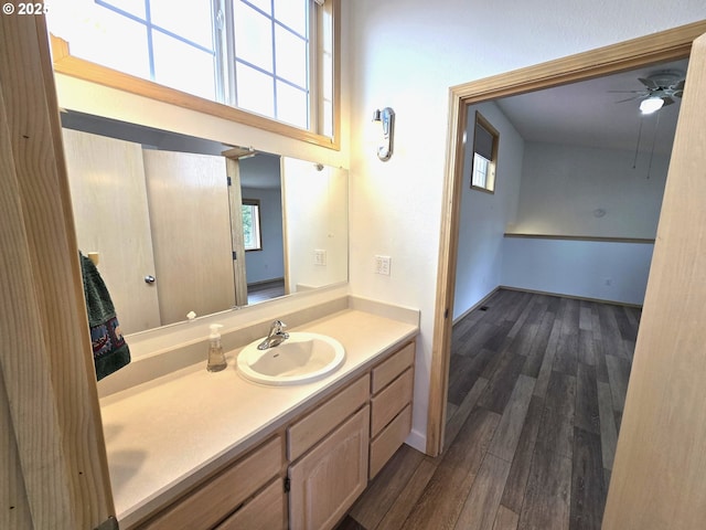 80393 Zimmer Ln, Hermiston, OR 97838 - bathroom featuring a ceiling fan, wood finished floors, and vanity