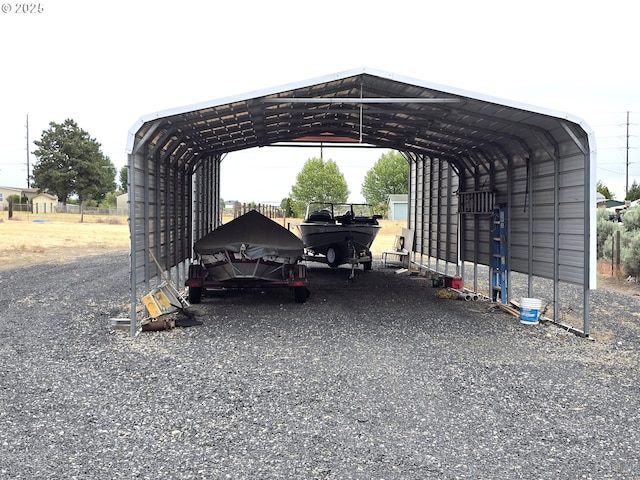 80393 Zimmer Ln, Hermiston, OR 97838 - view of parking featuring a detached carport and gravel driveway