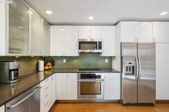 160 Iron Mountain Blvd, Lake Oswego, OR 97034 - kitchen with appliances with stainless steel finishes, white cabinetry, backsplash, and recessed lighting