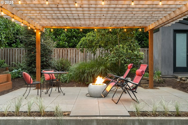160 Iron Mountain Blvd, Lake Oswego, OR 97034 - fenced backyard with an outdoor fire pit and a patio area