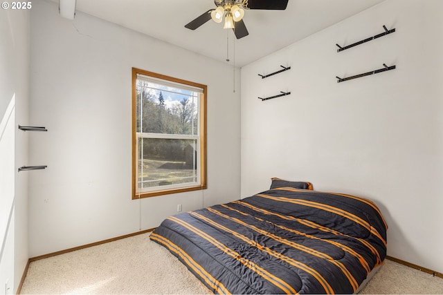 bedroom featuring ceiling fan and carpet floors