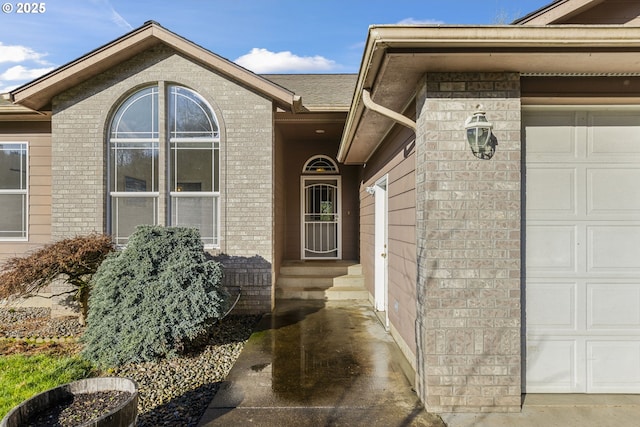 property entrance with a garage