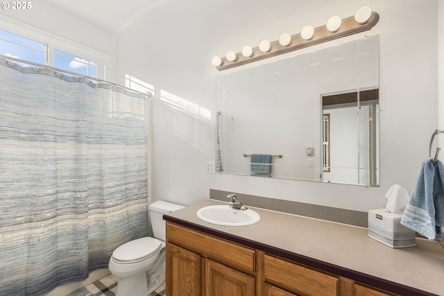 bathroom with a shower with curtain, vanity, and toilet