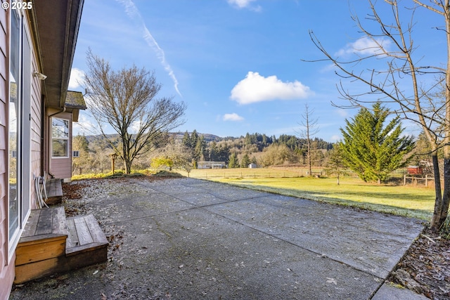 view of patio with a mountain view