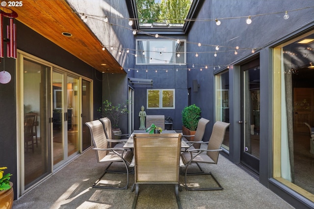 view of patio featuring outdoor dining space