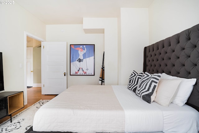 bedroom featuring hardwood / wood-style floors