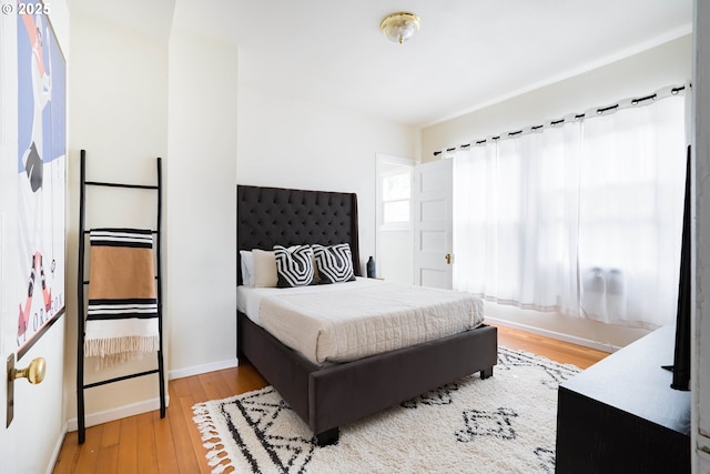 bedroom featuring hardwood / wood-style flooring