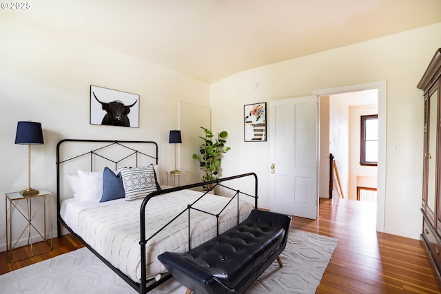 bedroom featuring dark hardwood / wood-style flooring