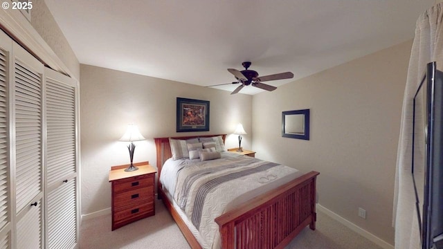 bedroom with baseboards, a closet, a ceiling fan, and carpet floors