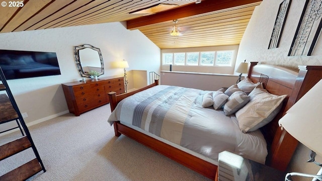 bedroom with baseboards, lofted ceiling with beams, wooden ceiling, and carpet floors