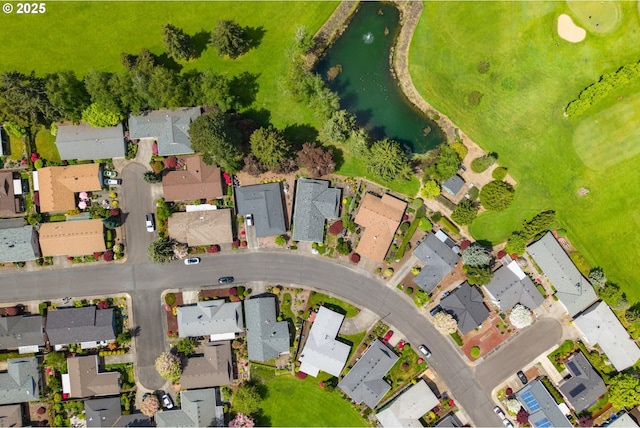 aerial view with a water view and a residential view