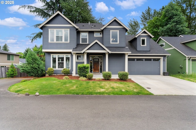 13046 SE Everett Ct, Milwaukie, OR 97222 - view of front facade with driveway, a garage, and a shingled roof
