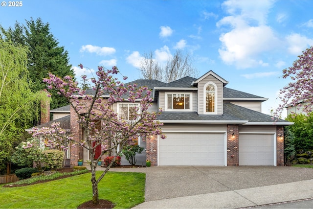view of front of house featuring driveway, brick siding, a front yard, a shingled roof, and an attached garage