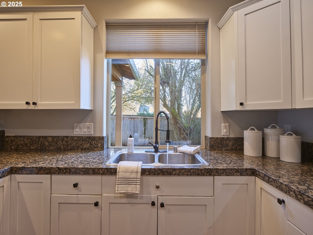 kitchen with sink and white cabinets