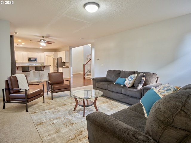 living room with ceiling fan