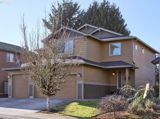 craftsman-style home with a garage