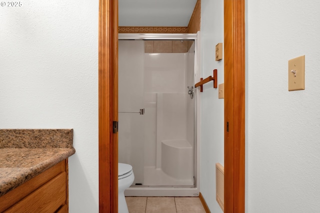 3909 Spruce St, Florence, OR 97439 - full bath featuring tile patterned flooring, a stall shower, toilet, and vanity