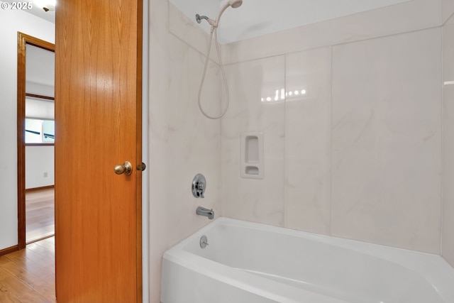 3909 Spruce St, Florence, OR 97439 - full bath with shower / bathtub combination and wood finished floors