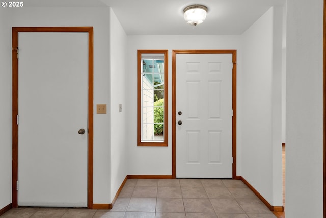 3909 Spruce St, Florence, OR 97439 - entryway featuring baseboards and light tile patterned floors