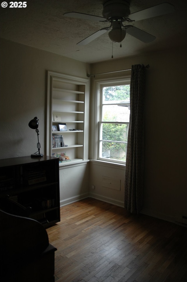 124 S 20th St, Saint Helens, OR 97051 - unfurnished room featuring hardwood / wood-style floors, ceiling fan, and a textured ceiling