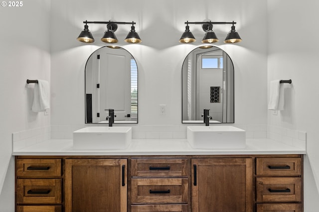 bathroom with vanity and a wealth of natural light