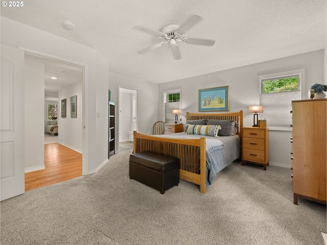 25210 E Arrah Wanna Blvd, Welches, OR 97067 - bedroom featuring carpet, multiple windows, and baseboards