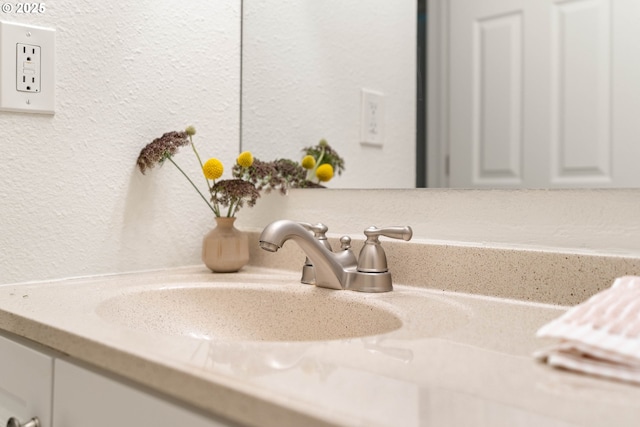 12620 NW Barnes Rd, Portland, OR 97229 - bathroom view of vanity and a textured wall