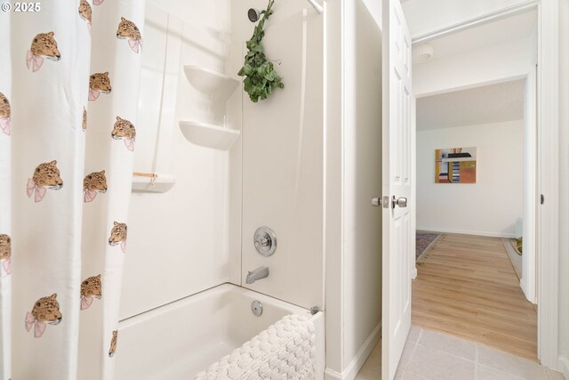 12620 NW Barnes Rd, Portland, OR 97229 - bathroom with shower / tub combo and tile patterned floors