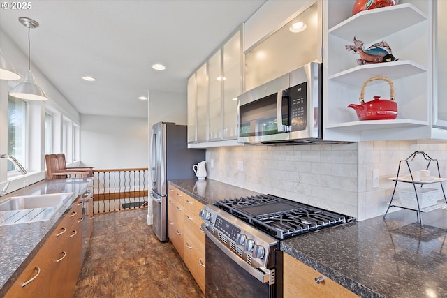 2941 NE Loop Dr, Otis, OR 97368 - kitchen featuring stainless steel appliances, a sink, modern cabinets, open shelves, and backsplash